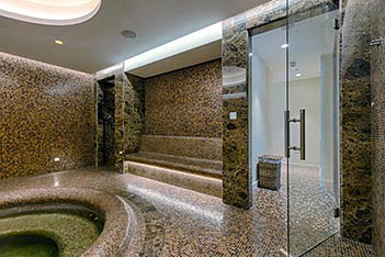 Dark brown emperador marble used for the indoor pool