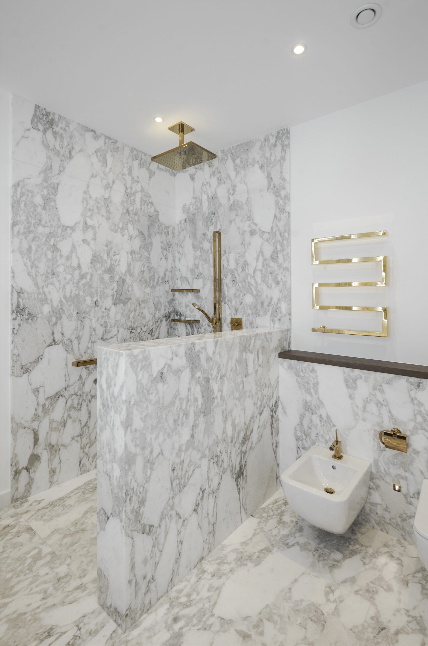 calacatta oro marble shower