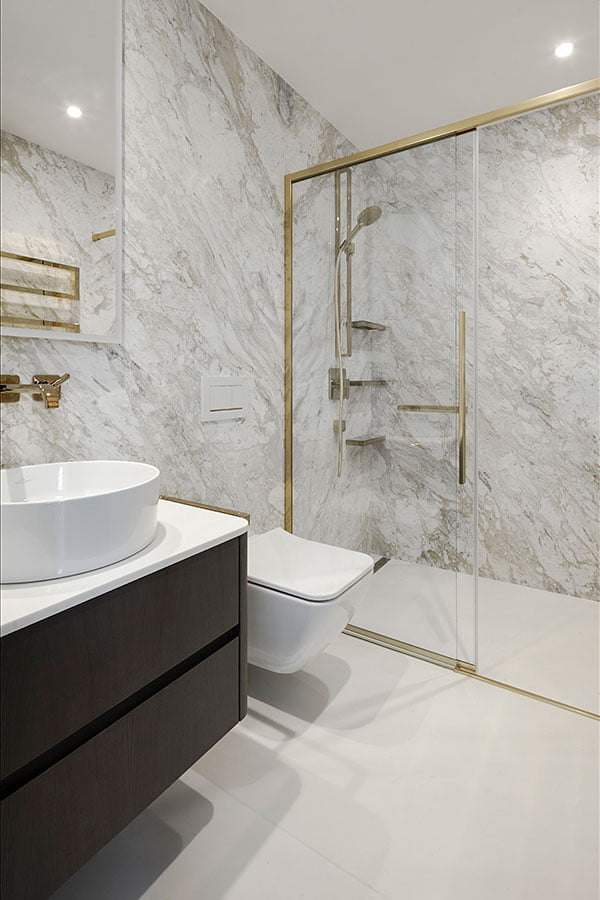 volakas gold marble bathroom walls