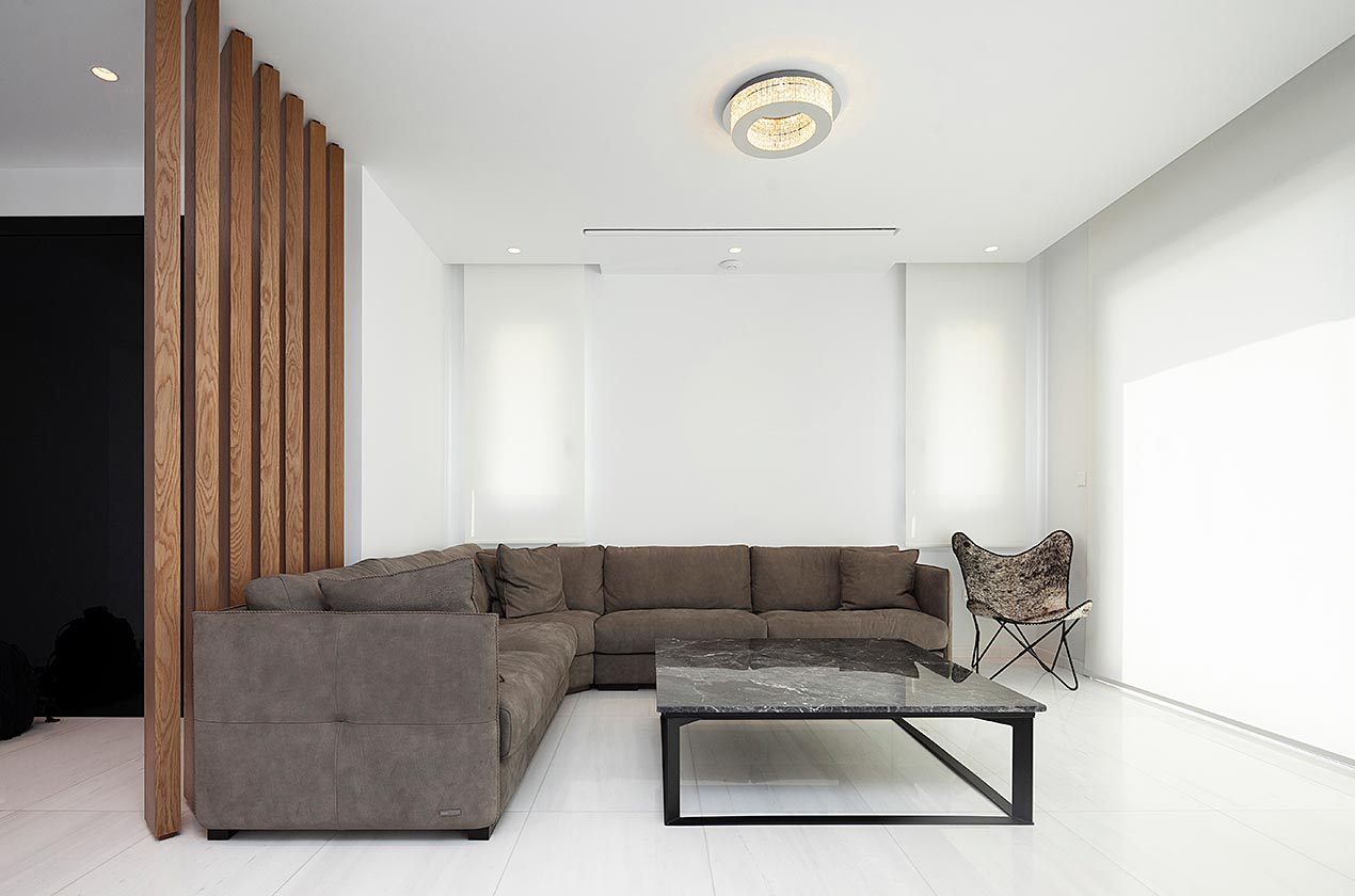 Stylish and custom coffee table made of Argos Black marble in the living room