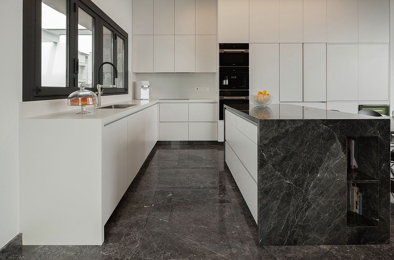 Black marble argos kitchen with white shelves