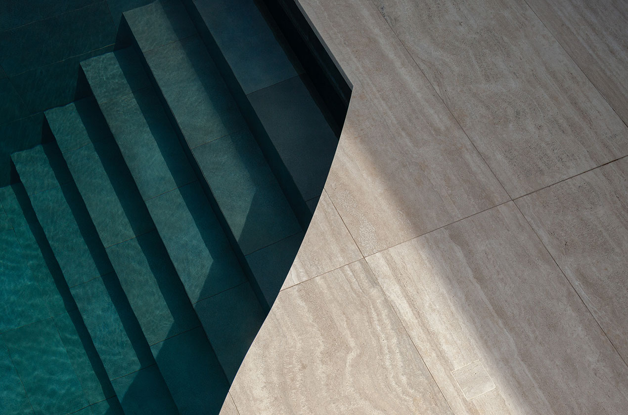 Travertino classico outdoor floor tiles next to pool