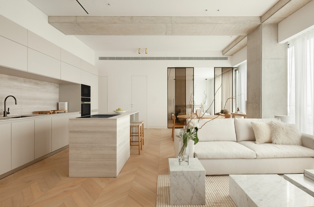 Refined apartment with marble kitchen and natural oak floors