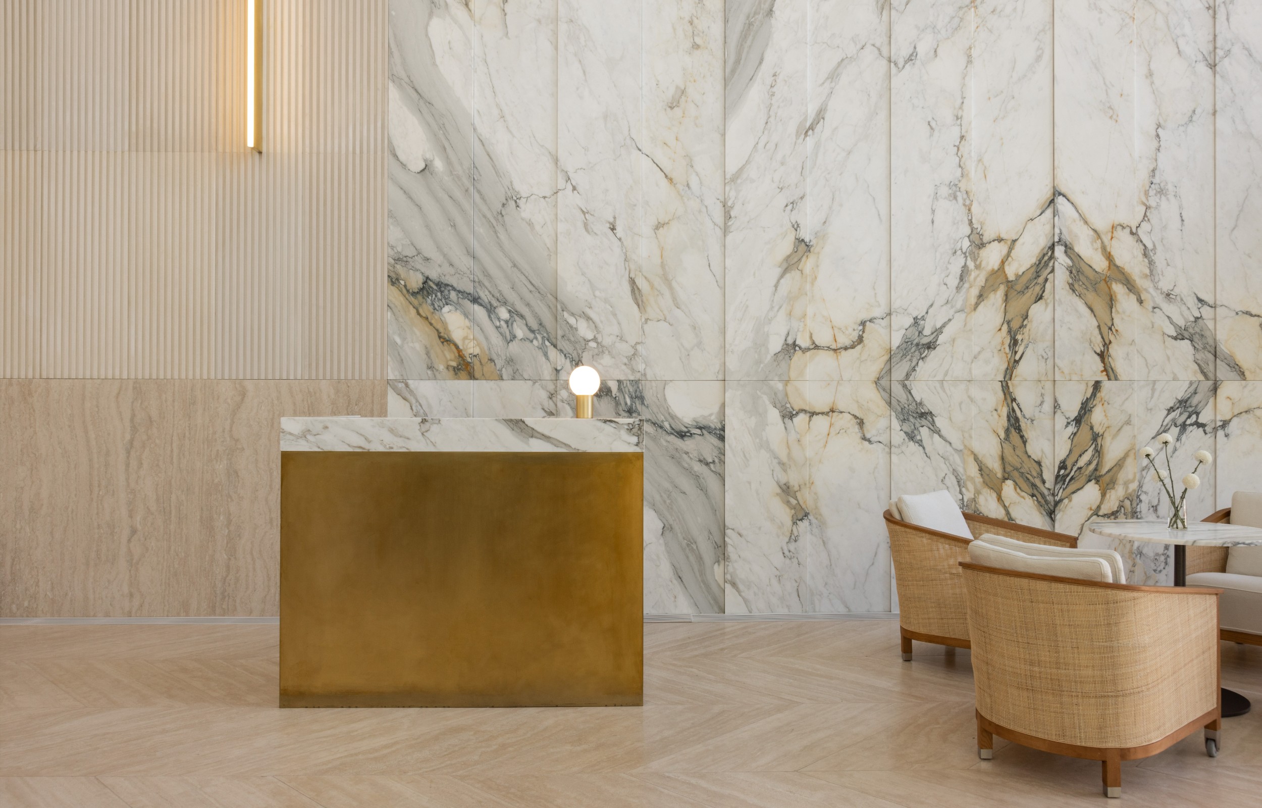 Calacatta oro marble and travertine combination hero