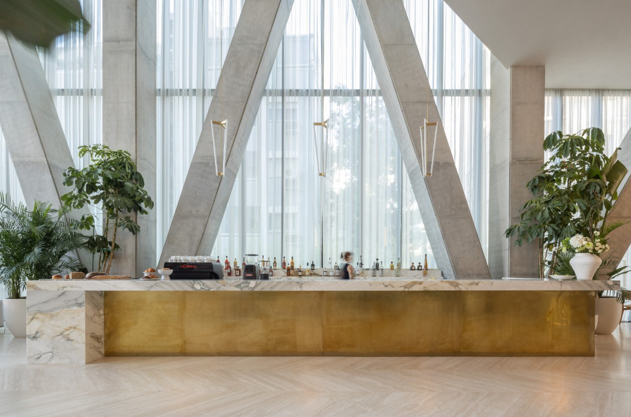Custom designed gold bar with calacatta oro marble