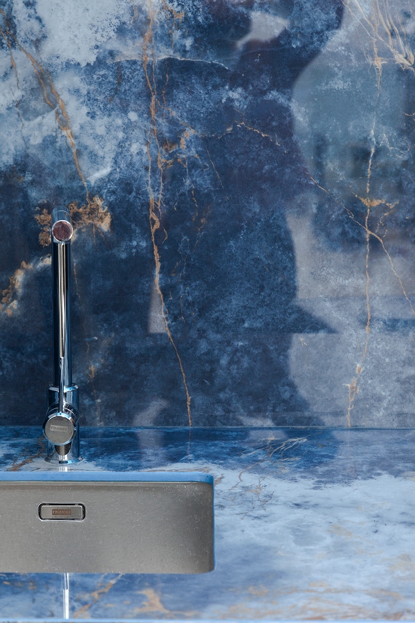 deep blue onyx effect surface with washbasin